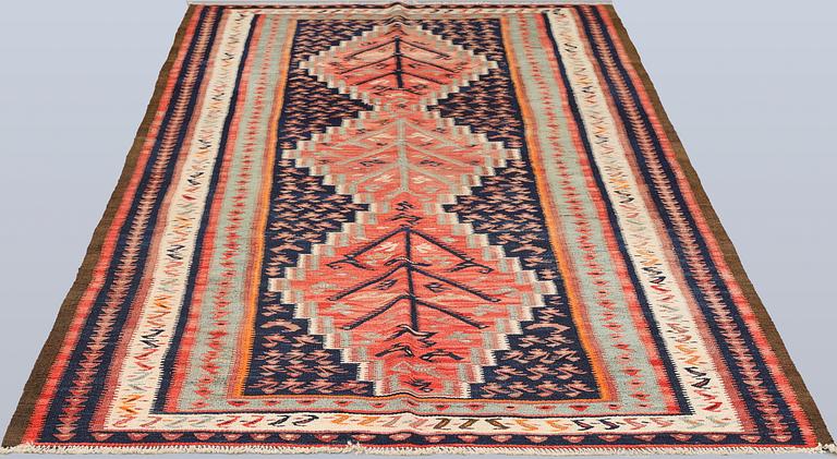 A Nomad Kelim cord carpet, 290 x 142 cm.