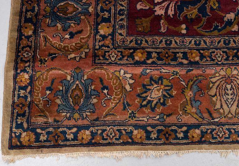 A carpet, semi-antique Tabriz, ca 357,5 x 256 cm.