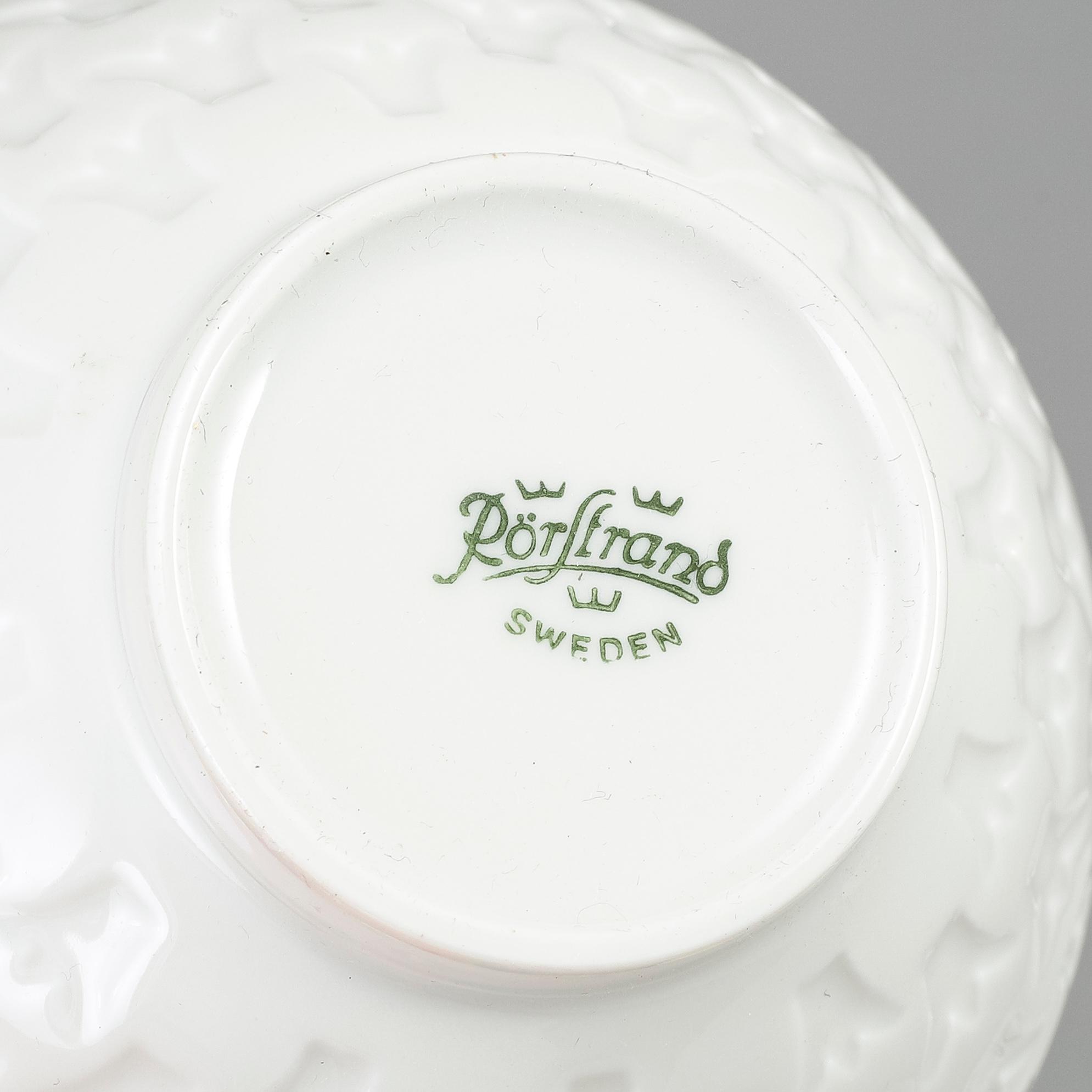 GUNNAR NYLUND, twelve porcelain bowls from Rörstrand.