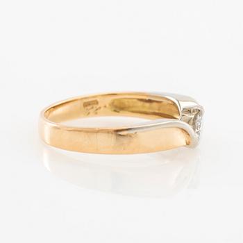 Ring 18K rött och vitt guld med en rund briljantslipad diamant, Raiteri & Carrero Valenza Italien.