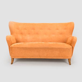 A mid-20th century sofa.