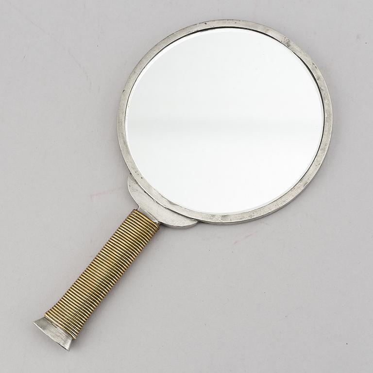 Estrid Ericson & Björn Trädgårdh, a pewter and brass handmirror from Firma Svenskt Tenn.