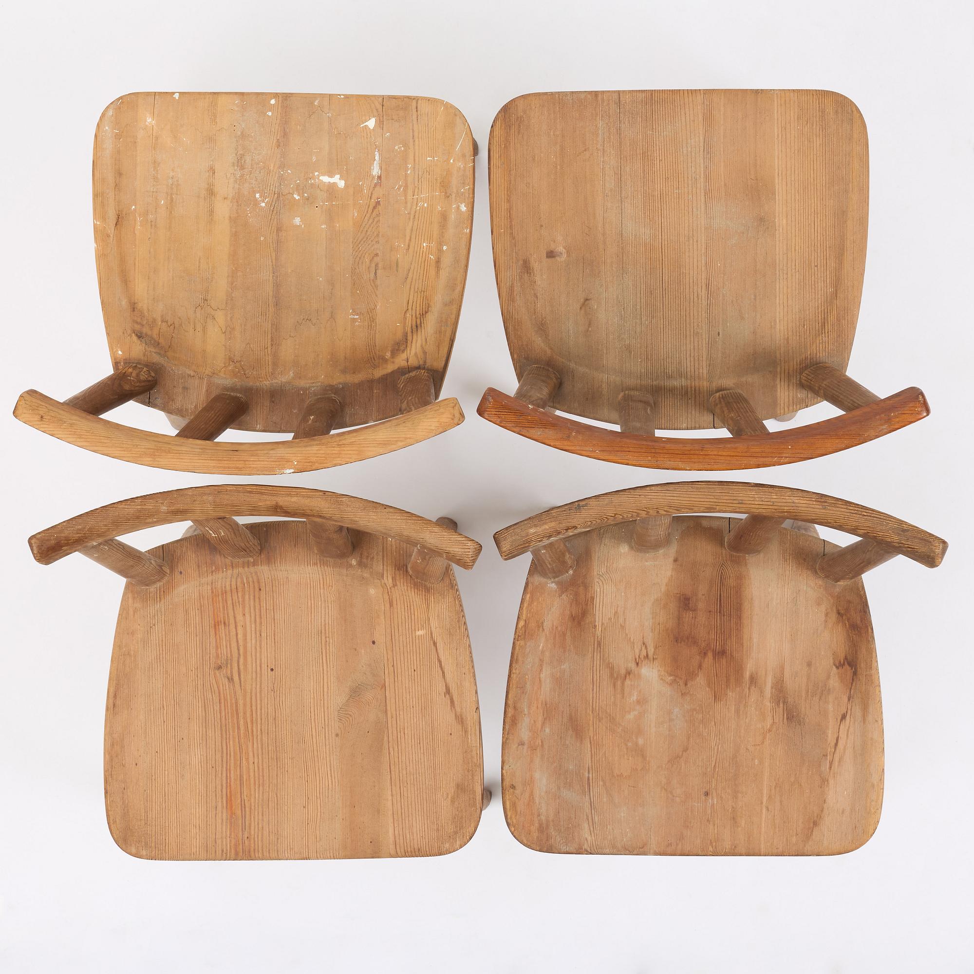 Axel Einar Hjorth, a set of four stained pine "Utö" chairs, Nordiska Kompaniet, Sweden, 1930s.