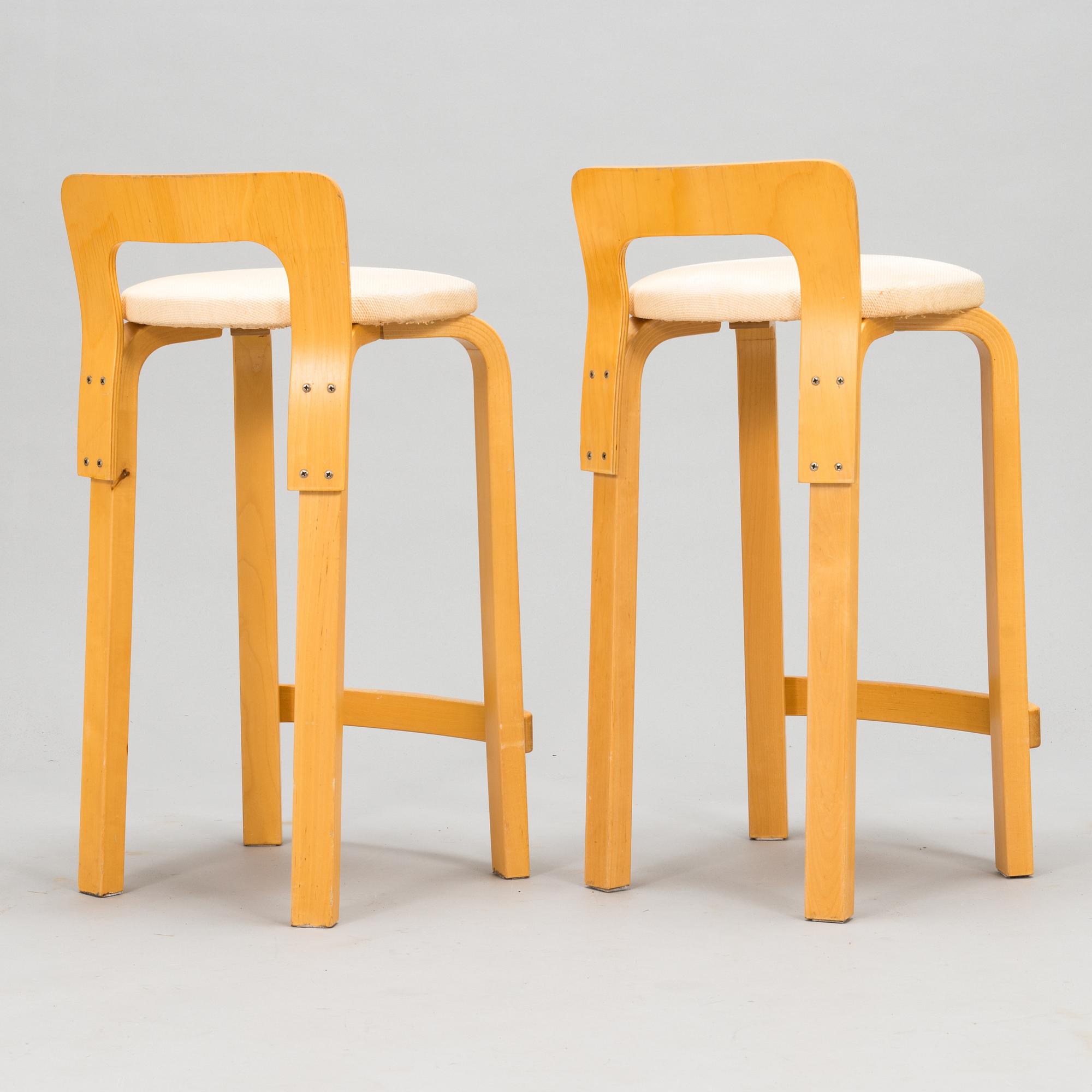 Alvar Aalto, Alvar Aalto, A pair of K65 bar stools, Artek, Finland, late 20th century.