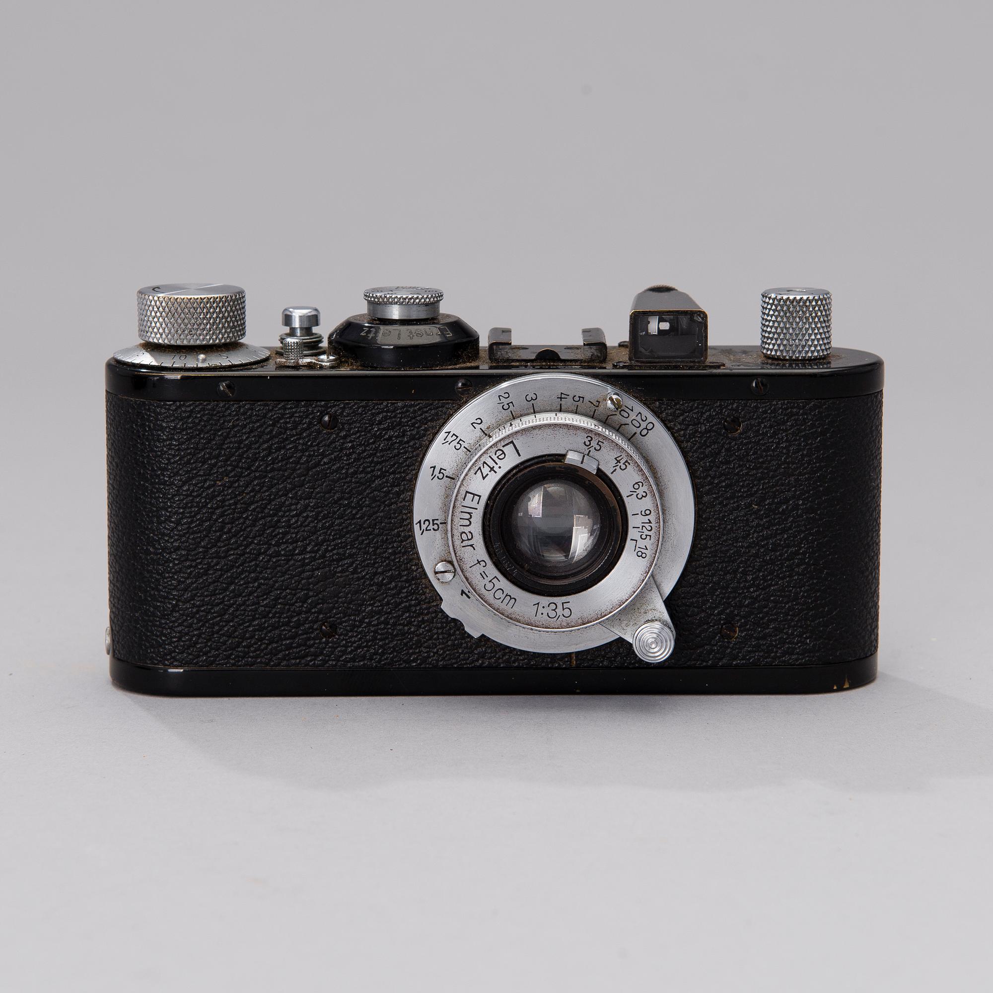 A black body Leica camera no 296865 with a Elmar lens made in 1938