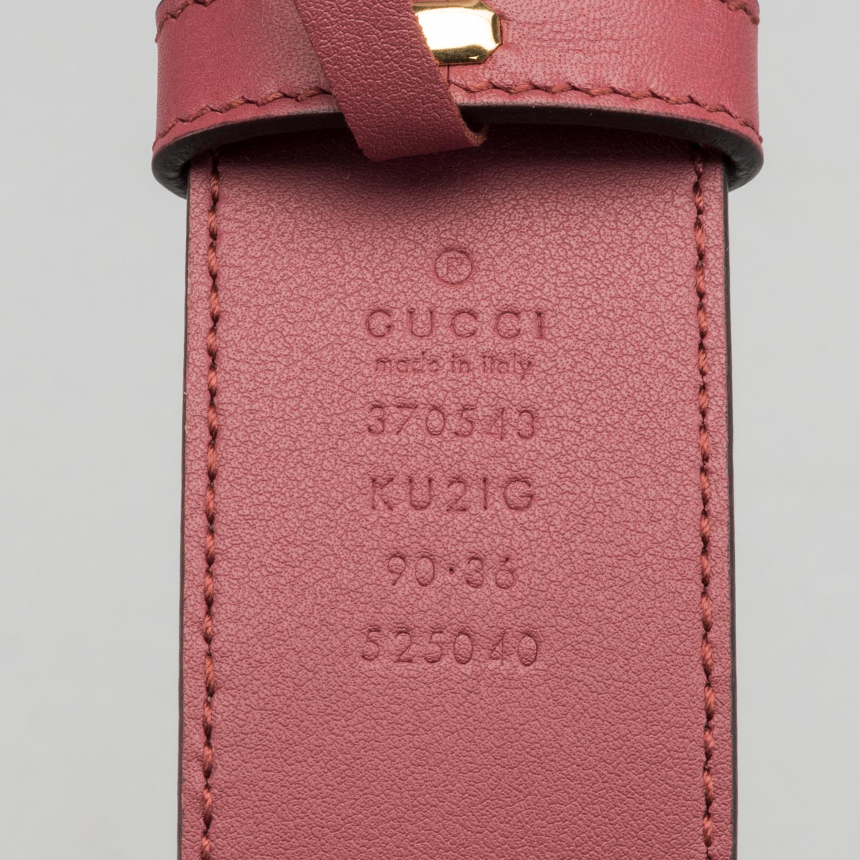 A Gucci blooms belt.