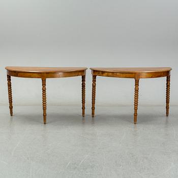 A two-piece birch dining table from around the year 1900.