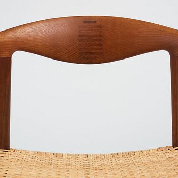 Hans J. Wegner, a teak, oak and cane "Cowhorn chair", JH 505, Johannes Hansen, Denmark 1950-60's.