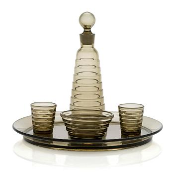 Aino Aalto, a 4-piece 1930s 'Bölgeblick' glass service for Karhula Glassworks  and the tray for Karhula Glassworks.
