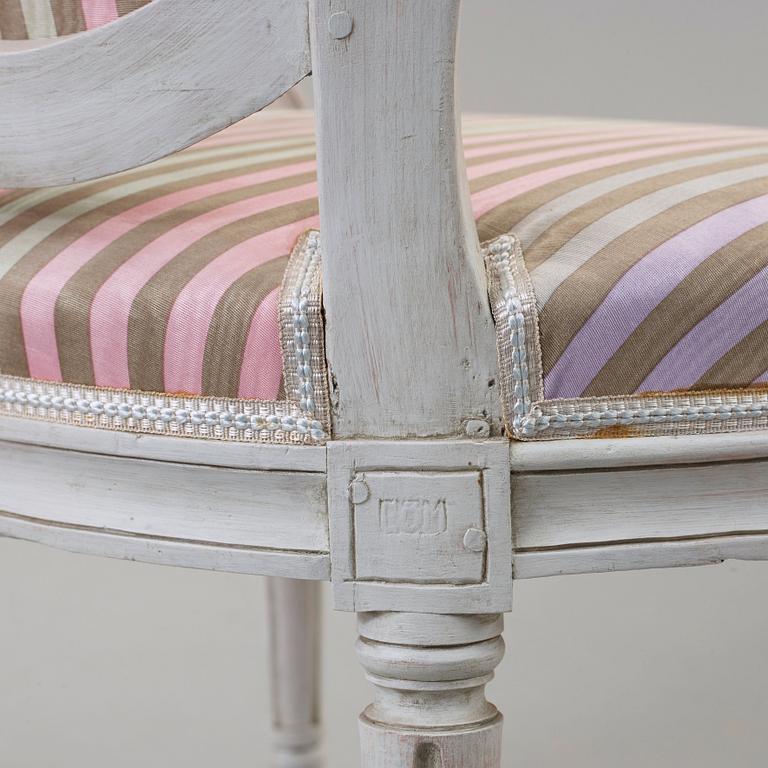 A pair of Gustavian late 18th century armchairs by Erik Öhrmark, master 1777.