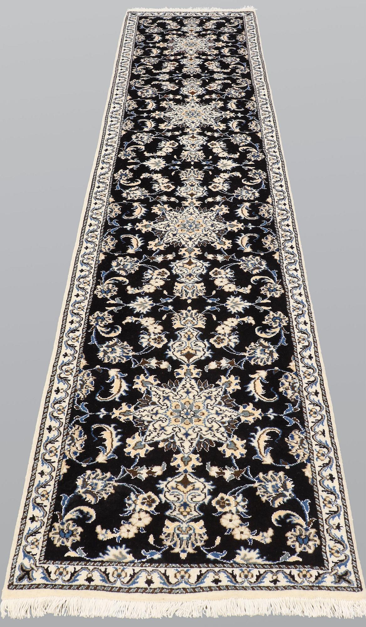 A runner, Nain, part silk, ca 378 x 77 cm.