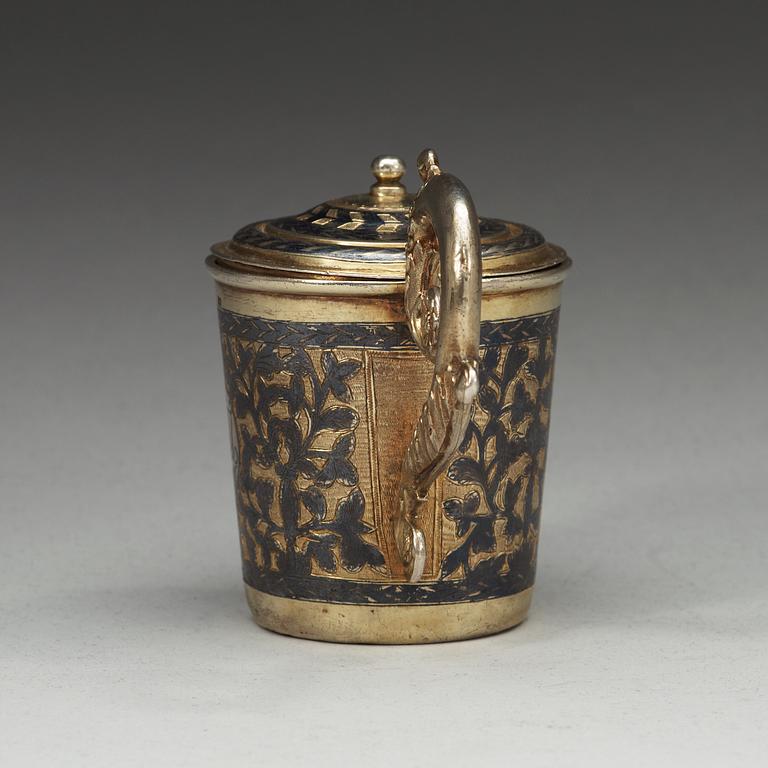 A Russian 19th century silver-gilt and niello cup and cover, unidentified makers mark, Moscow 1836.