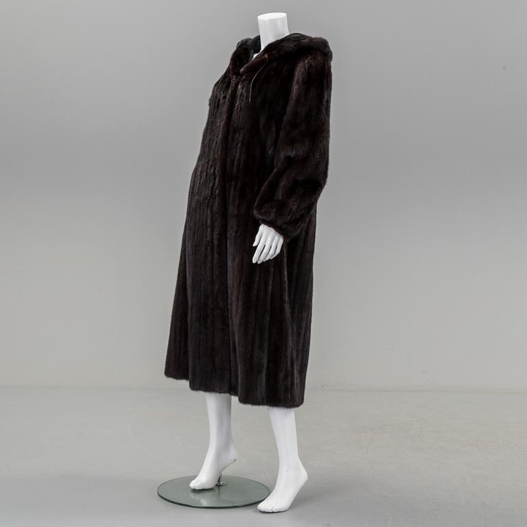 A mink coat by Saga Mink, in size 38/40.
