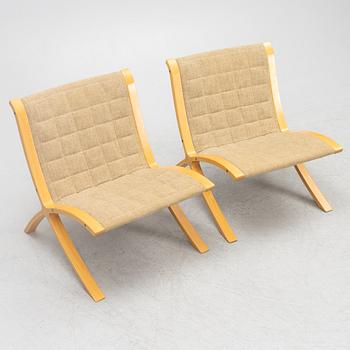 Peter Hvidt & Orla Mølgaard Nielsen, a pair of 'X' lounge chairs, Fritz Hansen, Denmark, 1980.