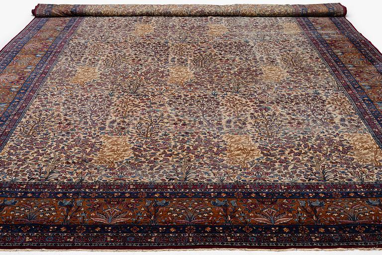 An antique 'Millefleur' Kerman Laver carpet, c. 964 x 426 cm.