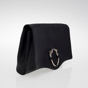 A LEATHER RIBOT HORSE HEAD CLUTCH.