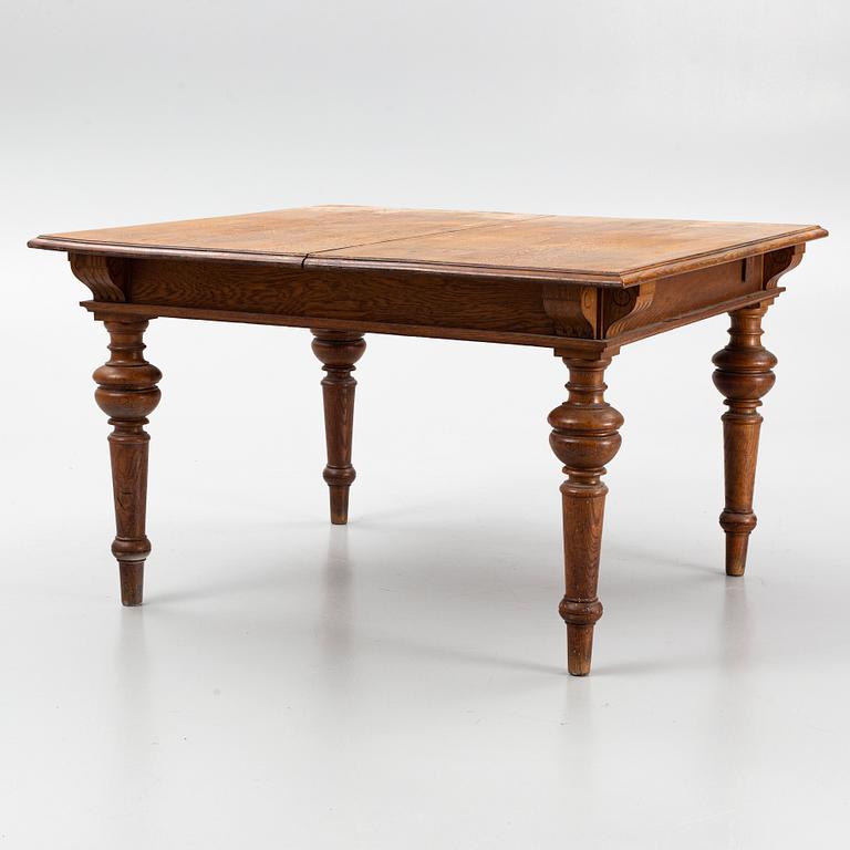 A dining table, late 19th Century.