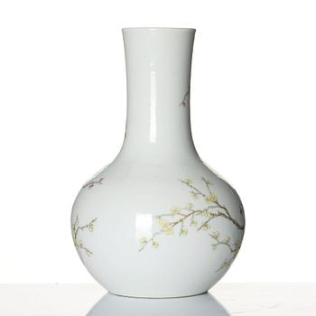 A famille rose 'mag-pies and prunus' vase, late Qing dynasy/Republic with Yongzheng mark.