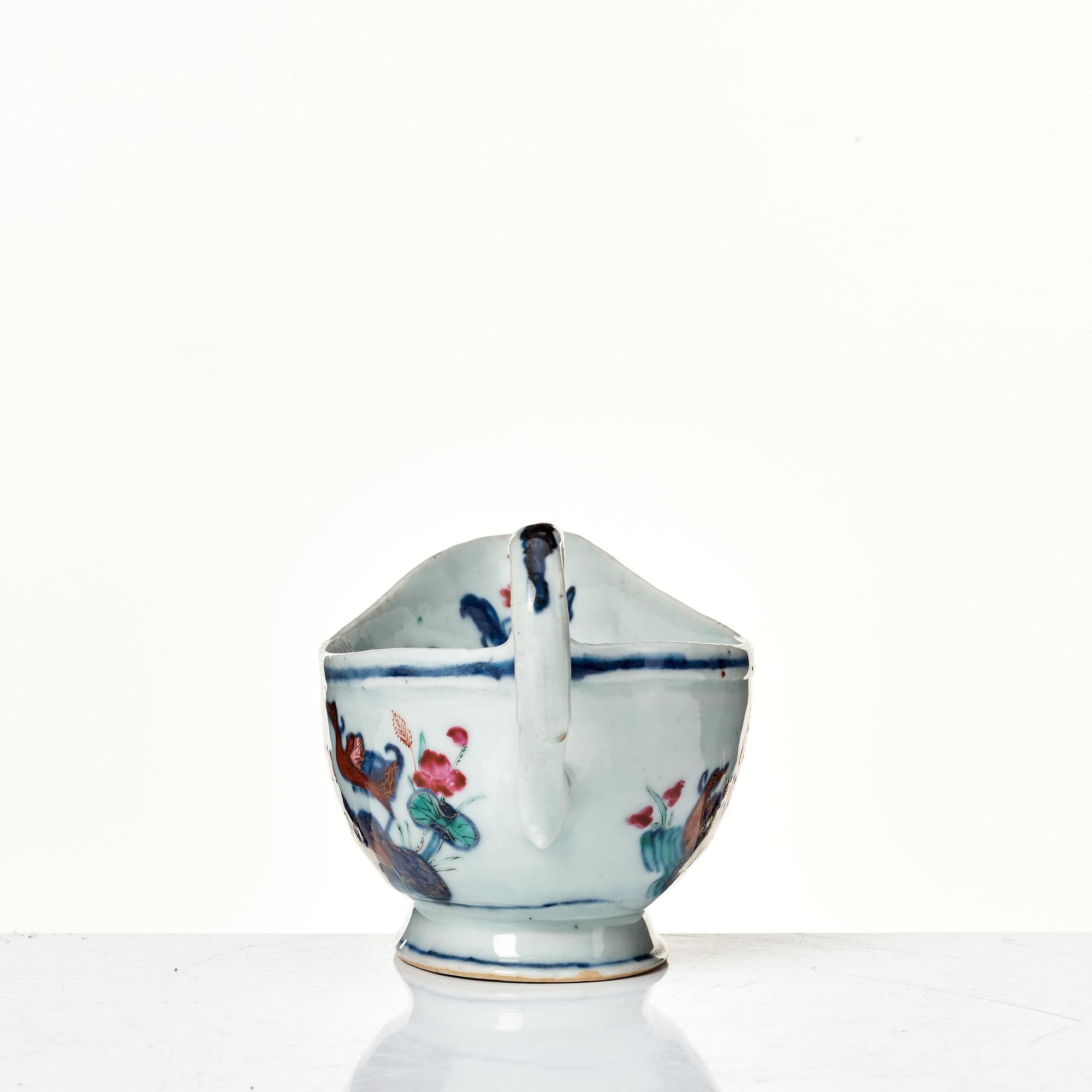 A famille rose "tobacco leaf" sauce boat, Qing dynasty, Qianlong (1736-95).