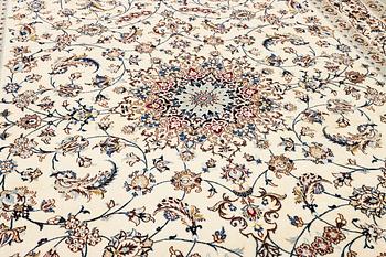 A part silk Nain carpet, 9 LA, a. 398 x 289 cm.