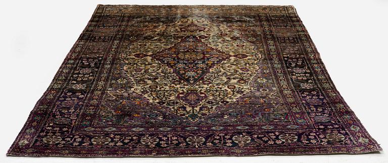 An antique silk Kashan rug, Central Persia, c. 207 x 131 cm.
