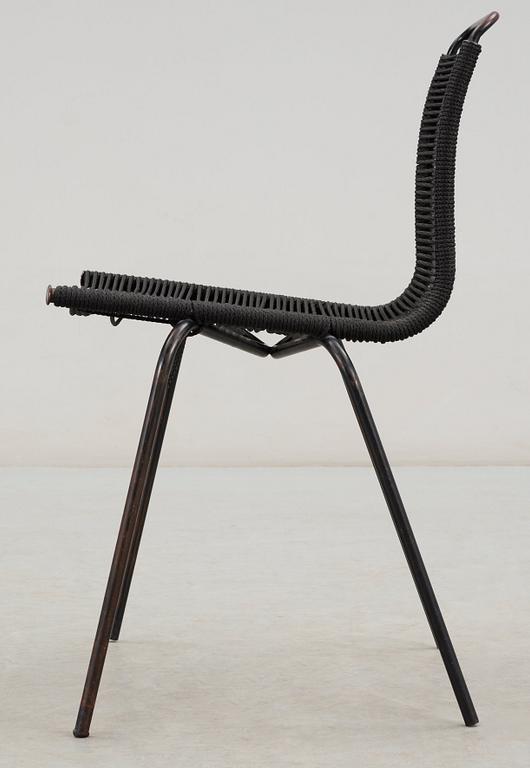 A Poul Kjaerholm 'PK-2' chair, probably for E Kold Christensen, Denmark, halyard seat with black enameled metal frame.