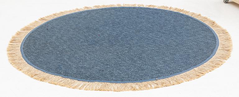 A rug, diameter circa 188 cm.