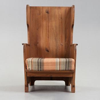 An Axel Einar Hjorth 'Lovö' stained pine armchair, Nordiska Kompaniet, Sweden 1930's.