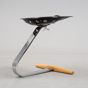 A 'Mezzadro' stool by Achille Castiglione & Pier Giacomo Castiglione for Zanotta, Italy.