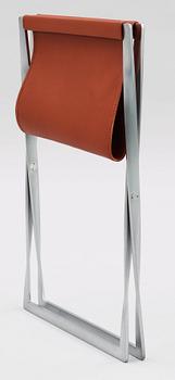 A Poul Kjaerholm 'PK-91' steel and brown leather stool, Fritz Hansen, Denmark.