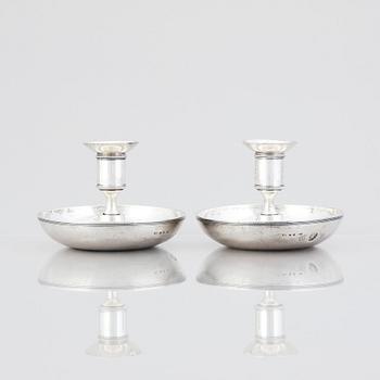 A pair of Swedish early 19th century silver chamber-candlesticks, mark of Adolf Zethelius, Stockholm 1816.