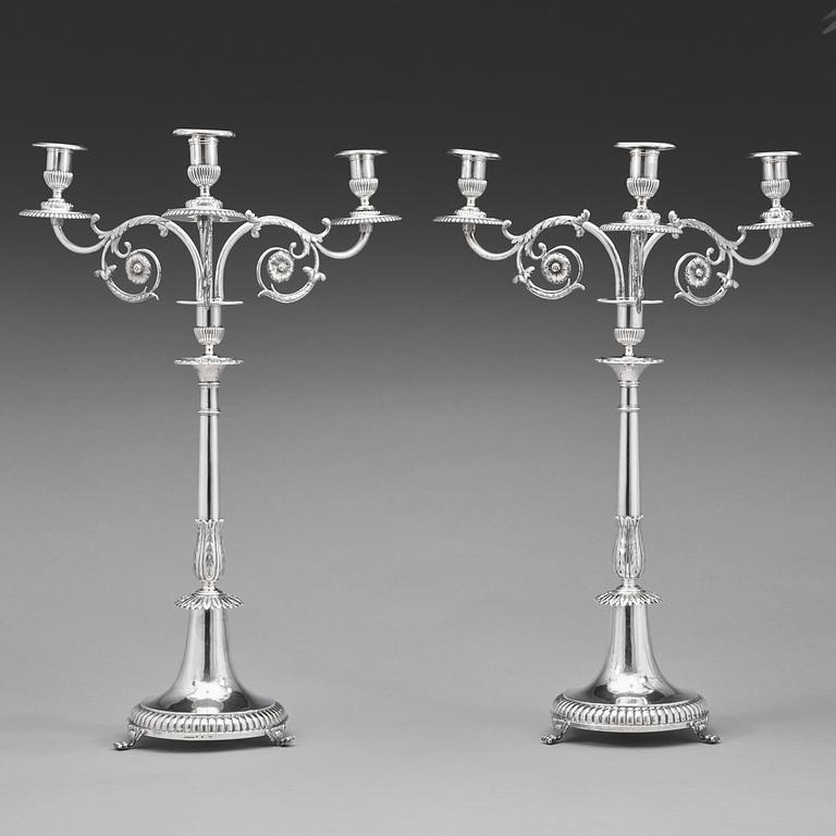 JOHAN-PETTER GRÖNWALL, ett par för tre ljus, Stockholm 1829-1830. kandelabrar, silver, empire.