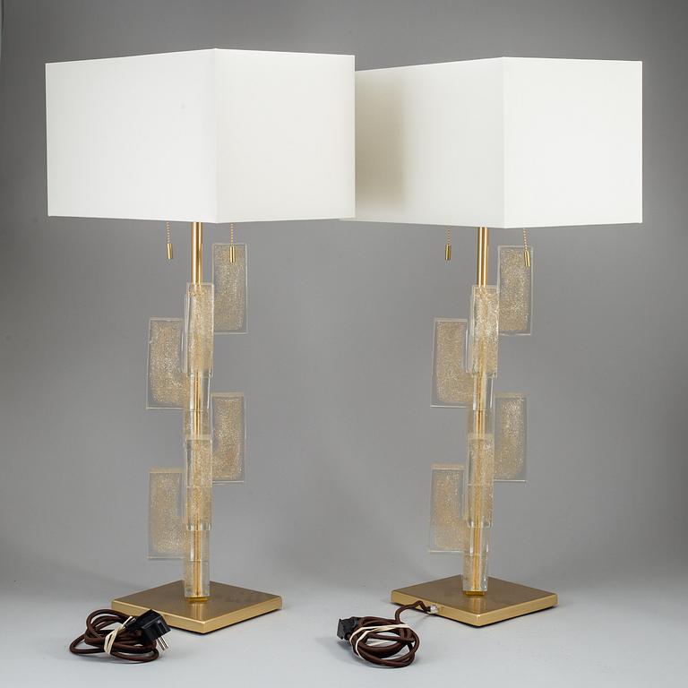 A 'Esha Alta' glass and brass table lamp from Donghia lightning.