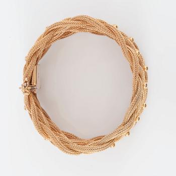ARMBAND i flätat guld. Troligen Italienskt.