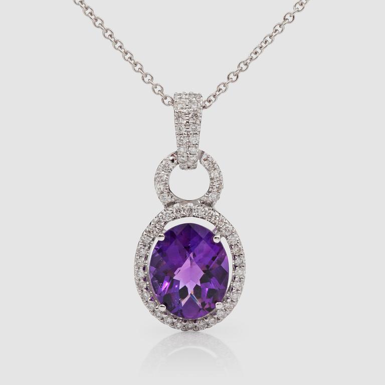 A 2.70 ct amethyst and brilliant-cut diamond pendant. Total carat weight of diamonds circa 0.42 ct. Chain included.