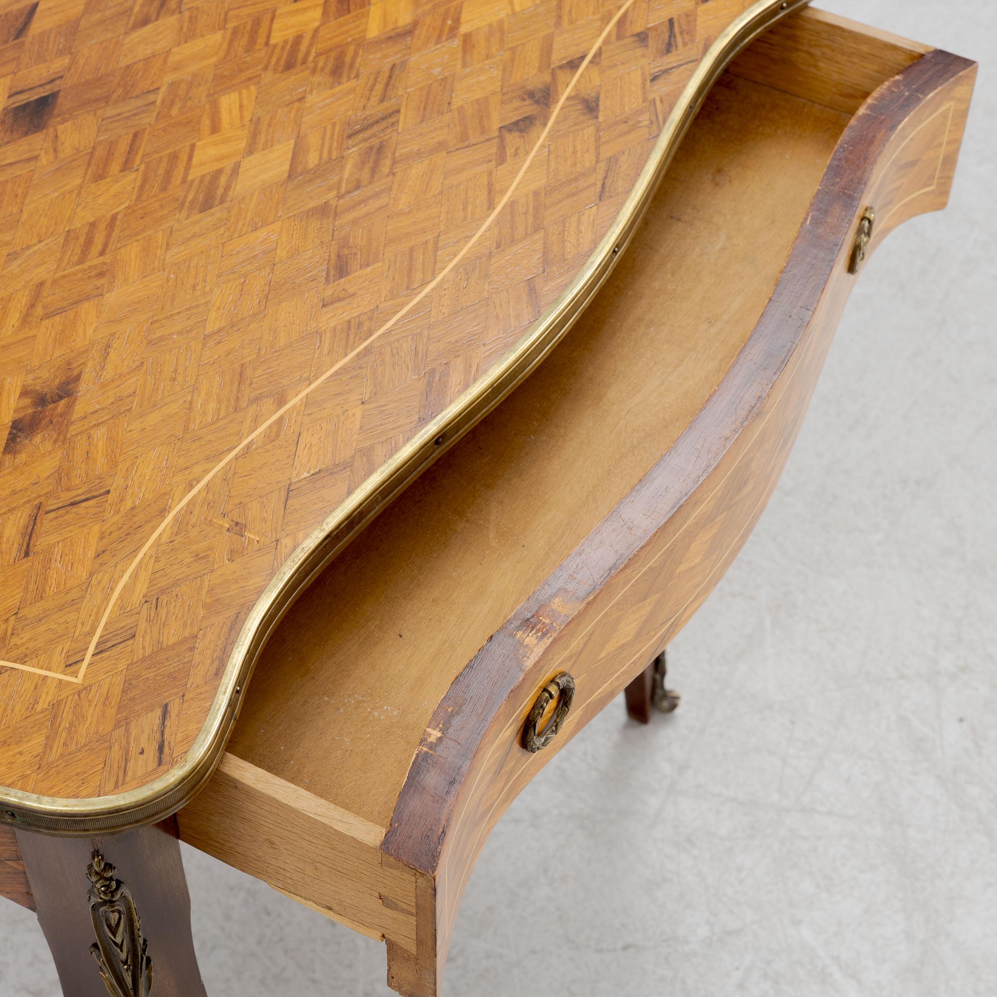 A Rococo style table, early 20th Century.