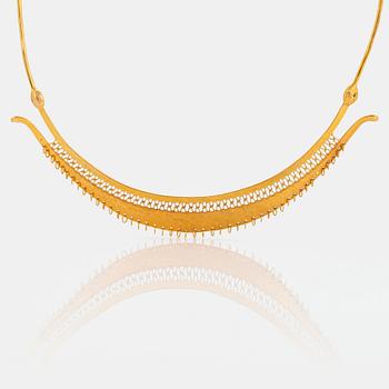 A Tapio Wirkkala 18K gold necklace.