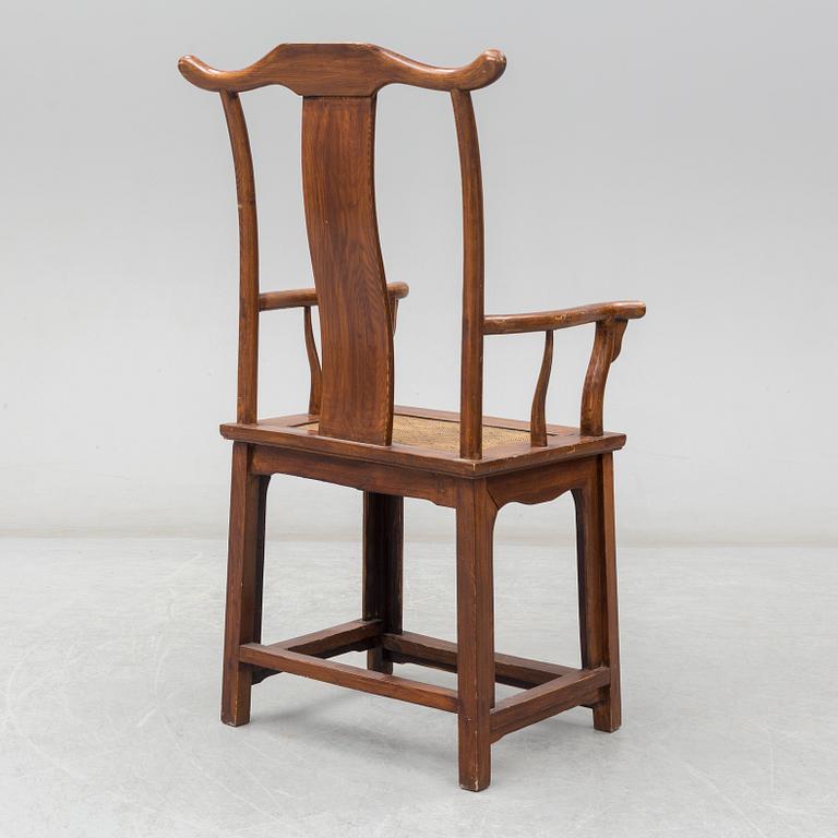 A Chinese wooden armchair, 20th century.