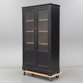 An early 20th century painted display cabinet.