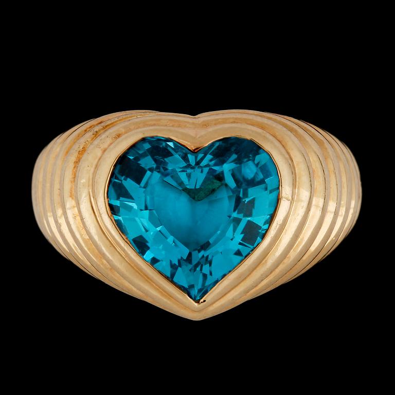 A heart cut blue topas ring.