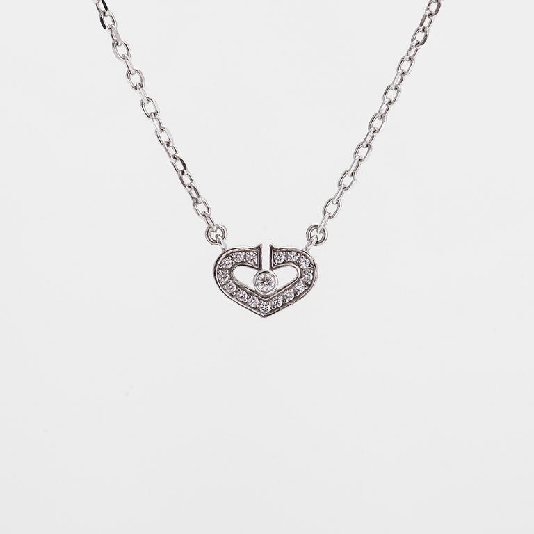 Cartier, an 18K white gold 'C Heart of Cartier' necklace with diamonds approx. 0.09 ct in total.
