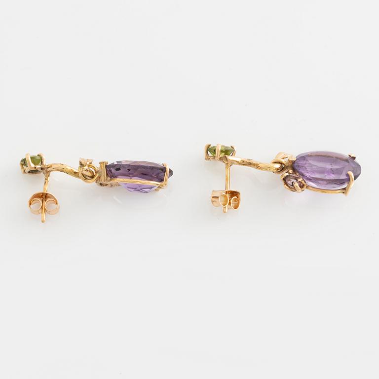 Earrings with oval amethysts, peridot, tourmaline, and small diamonds.