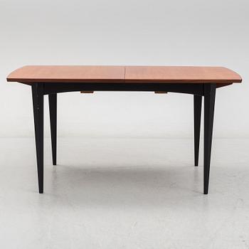 A 1950s/1960s teak and teak veneer table.