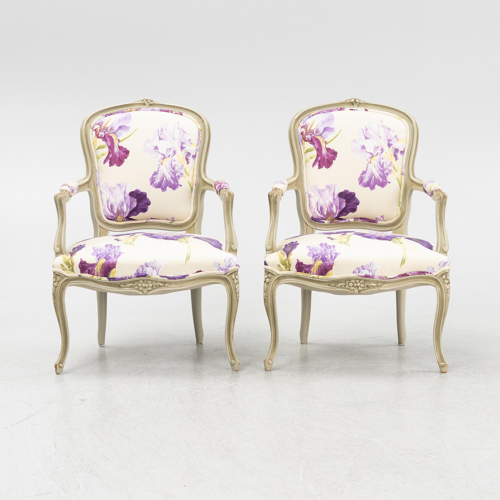 A pair of rococo style armchairs, 20th Century.