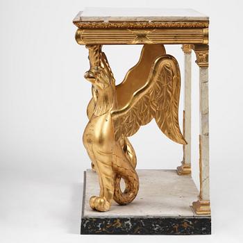 A Swedish Empire gilt wood and white marbel console table.