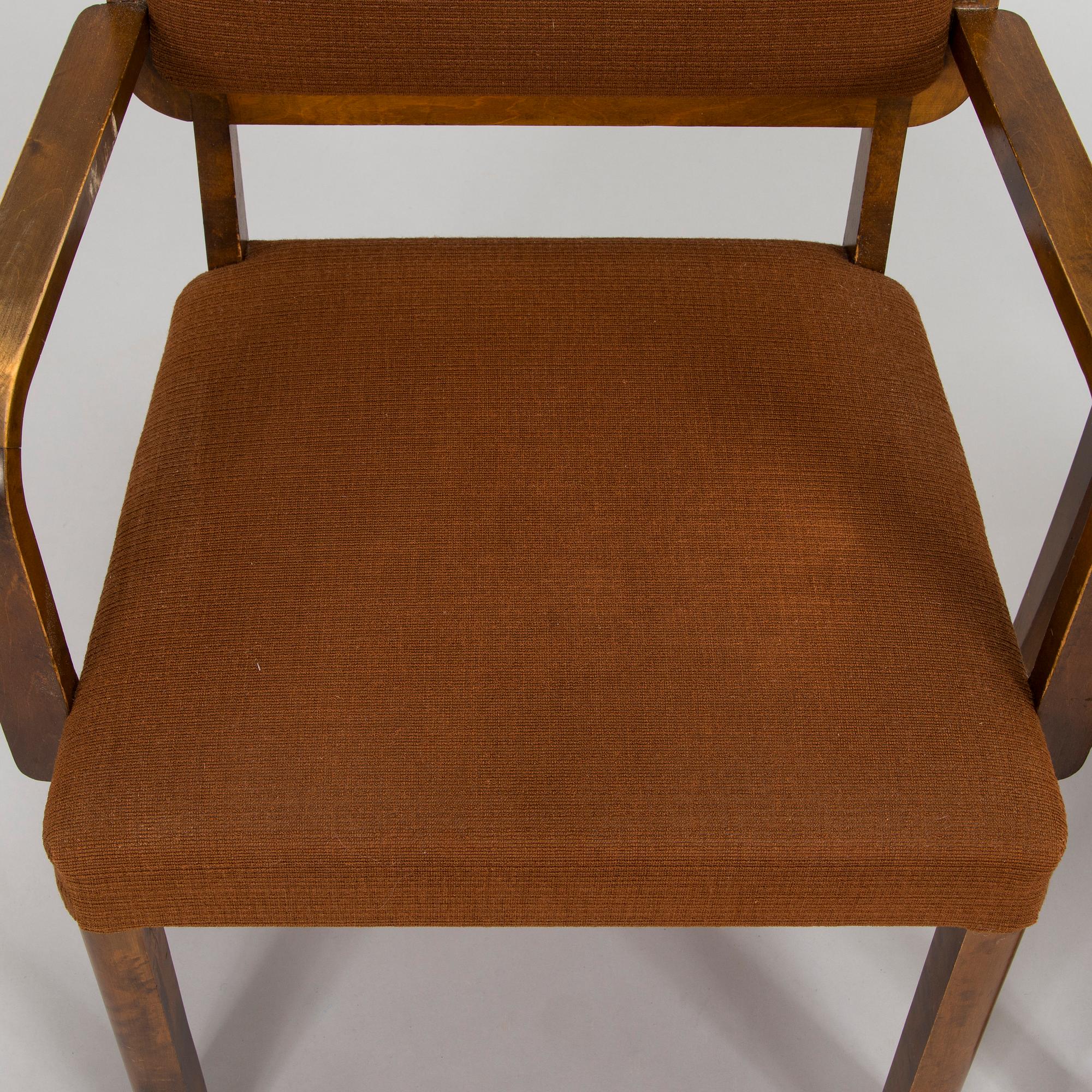 Two armchairs and six chairs, 1930s.