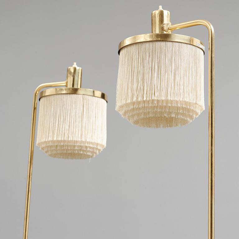 Hans-Agne Jakobsson, a pair of brass floor lamps, Markaryd, Sweden 1960-70's.