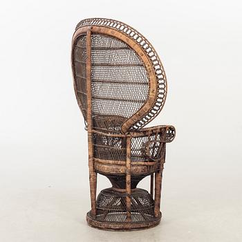 AN RATTAN EASY CHAIR.