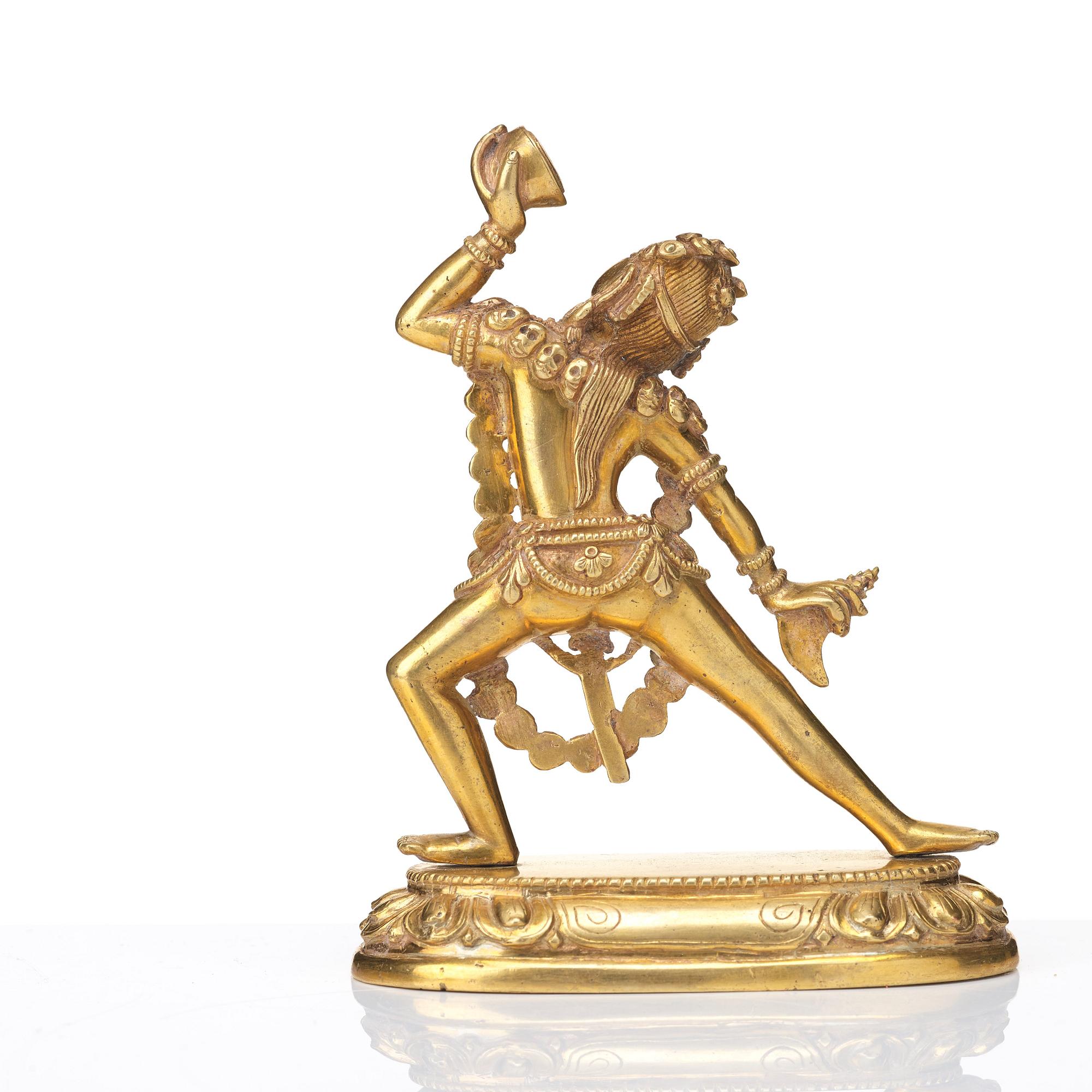 A gilt bronze figure of Dakini, Tibeto-Chinese, 19th Century.