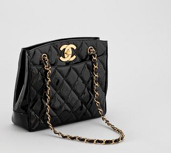 A 1980s black quilt leather shoulder bag by Chanel.